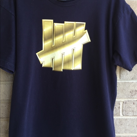 COPY - 💥Undefeated Gold strikes t-shirt💥 - Picture 2 of 6